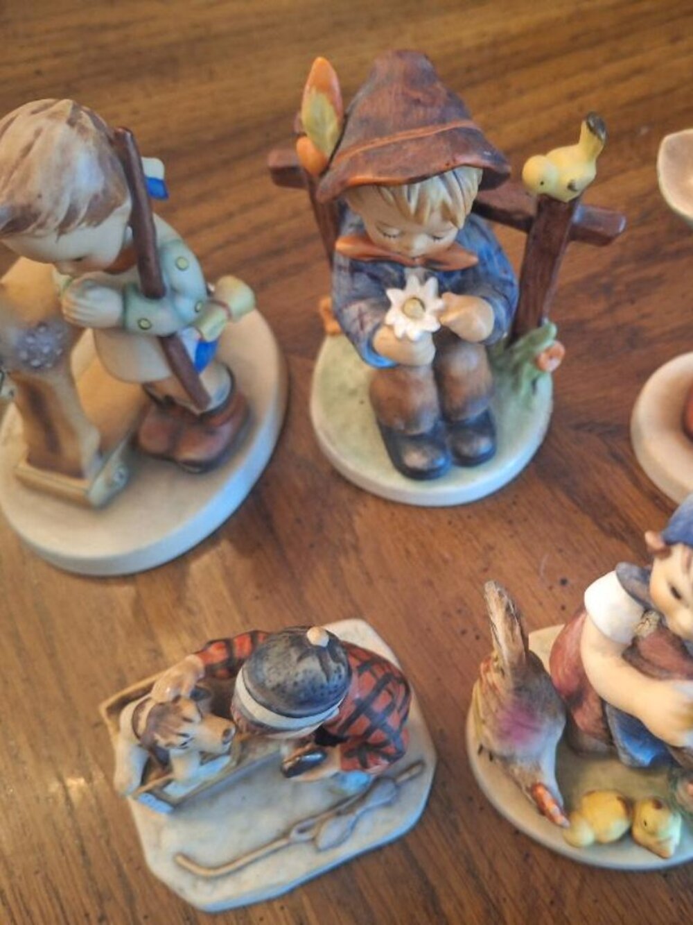 4 Vintage HUMMELS 1 Norman Rockwell in excellent condition